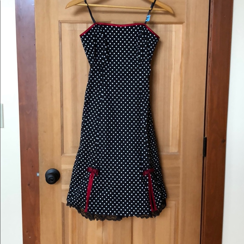 Black polka dot mini dress w red details by A.Byer
